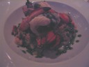 "Maine lobster with lobster coral risotto, peas, spring onions, 
zucchini, spinach, cherry tomatoes, herb emulsion."  Basically a lobster 
risotto.  Mom and I thought this was the best dish.

 Artificially 
brightened.
